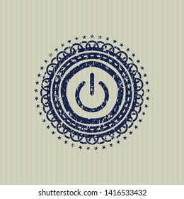 Blue power icon inside distressed rubber grunge seal