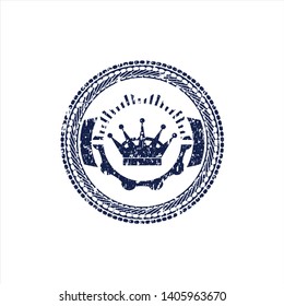 Blue queen crown icon inside rubber seal with grunge texture