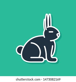 Blue Rabbit icon isolated on green background.  Vector Illustration