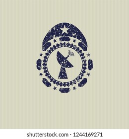 Blue radar icon inside distressed rubber seal