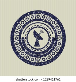 Blue radar icon inside rubber stamp with grunge texture