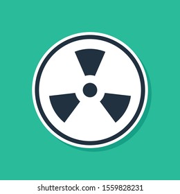 Blue Radioactive icon isolated on green background. Radioactive toxic symbol. Radiation Hazard sign.  Vector Illustration