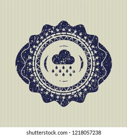 Blue rain icon inside distressed rubber grunge texture stamp