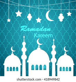 Blue Ramadan Kareem greetings background with hanging lanterns, stars and crescent moon, and mosque silhouette. Ramadan Kareem means Ramadan the Generous Month