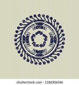 Blue recycle icon inside distressed rubber grunge texture seal