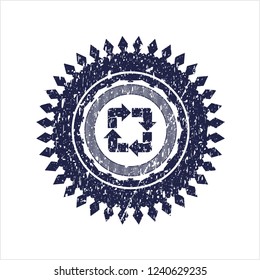 Blue recycle icon inside rubber grunge seal