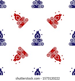 Blue and red Campfire icon isolated seamless pattern on white background. Burning bonfire with wood.  Vector Illustration