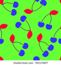 Blue and red cherries on a green background