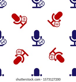 Blue and red Microphone with screwdriver and wrench icon isolated seamless pattern on white background. Adjusting, service, setting, maintenance, repair, fixing.  Vector Illustration
