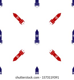 Blue and red Nuclear rocket icon isolated seamless pattern on white background. Rocket bomb flies down.  Vector Illustration