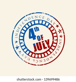 Blue and red rubber stamp for 4th of July, American Independence Day on brown background.
