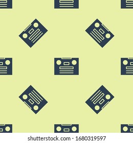Blue Retro audio cassette tape icon isolated seamless pattern on yellow background.  Vector Illustration