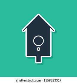Blue Retro wall watch icon isolated on green background. Cuckoo clock sign. Antique pendulum clock.  Vector Illustration