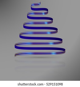 Blue ribbon with gold lines in shape of abstract christmas tree. Abstract bright christmas tree from bow with reflection and shadow on neutral gray background.