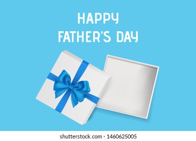 blue ribbon on white mock up empty gift box with happy farther day lettering on blue background