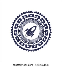 Blue rocket icon inside distress grunge stamp