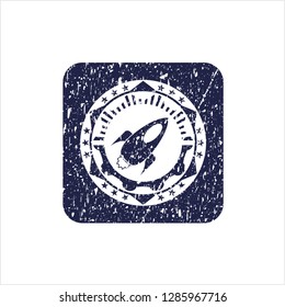 Blue rocket icon inside distressed rubber stamp with grunge texture