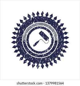 Blue roller brush icon inside rubber grunge stamp
