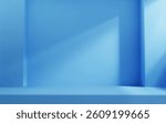 Blue room studio with table top and natural light. Product presentation template.