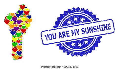 Blue rosette grunge seal with You Are My Sunshine phrase. Vector mosaic LGBT map of Benin of love hearts. Map of Benin collage created with love hearts in bright color tints.