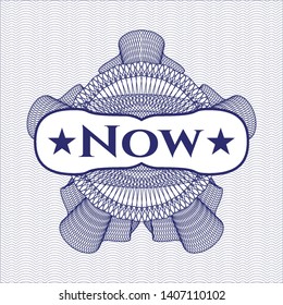 Blue rosette or money style emblem with text Now inside