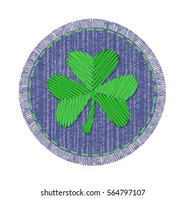 Blue round denim patch with green shamrock embroidery, stitch and fringe. Jeans fabric with Irish symbol of Saint Patricks Day.