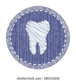 Blue round denim patch with white tooth embroidery, stitch and fringe. Jeans fabric with symbol of dental care. Element for design at International Dentist Day.