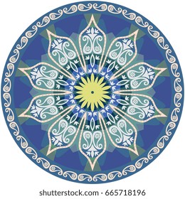 Blue round dish with flower mandala and paisley.