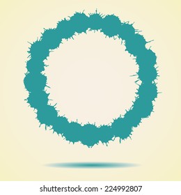 Blue round made of ink splashes with drop shadow. Vector illustration