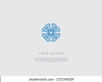 a blue round-edged diamond-shaped logo which looks like a flower