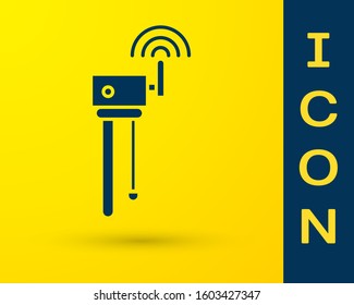 Blue Router and wi-fi signal symbol icon isolated on yellow background. Wireless ethernet modem router. Computer technology internet.  Vector Illustration
