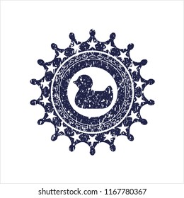 Blue rubber duck icon inside distressed rubber seal with grunge texture