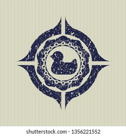 Blue rubber duck icon inside distress rubber grunge stamp