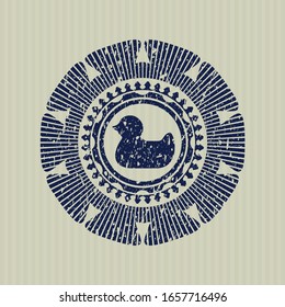Blue rubber duck icon inside distress grunge style stamp