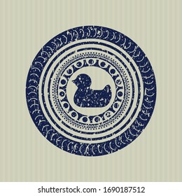 Icono de pato de goma azul dentro de la estampilla de grunge de socorro