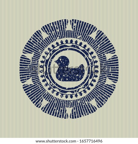 Blue rubber duck icon inside distress grunge style stamp