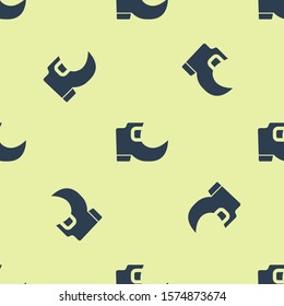 Blue Saint Patricks day irish tradition leprechaun boots icon isolated seamless pattern on yellow background.  Vector Illustration