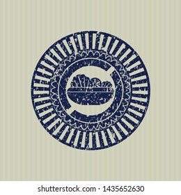 Blue salad icon inside distressed rubber grunge texture seal