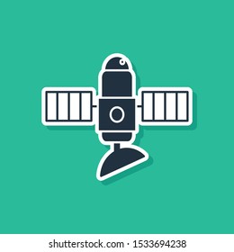 Blue Satellite icon isolated on green background.  Vector Illustration