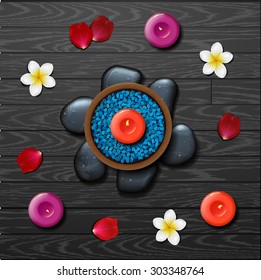 Blue sea salt. spa background. spa background with tropical flowers and stone spa candle. Summer tropical green leaves