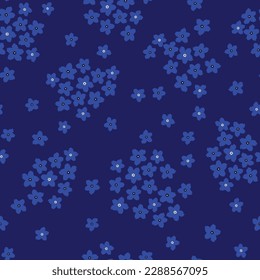 blue seamless floral vector small flowers pattern on navy background