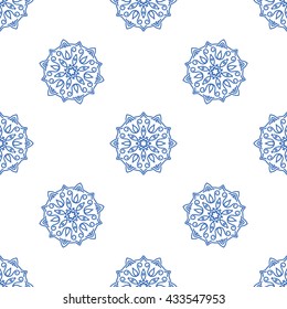 Blue seamless ornamental pattern on white background. Vector oriental illustration.