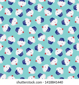 Blue seamless pattern with cupcakes