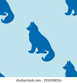 Blue seamless pattern with silhouette of a wolf or dog. Design for wallpaper, wrapping, fabric, textile.