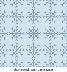 Blue seamless pattern with simple blue snowflakes for Christmas and New Year design, wrapping paper, wallpapers. 