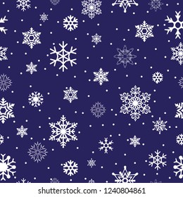 Blue seamless pattern with snowflakes