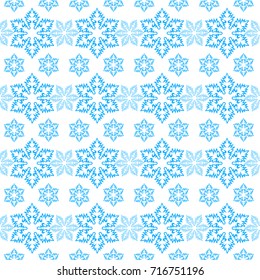 blue seamless pattern of snowflakes on a white background