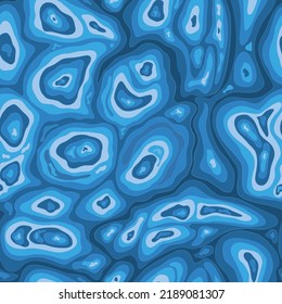 Blue seamless pattern with wavy closed abstract curves and spots.