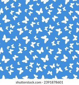 Blue seamless pattern with white butterlfy