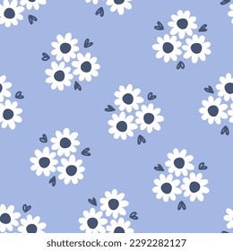 Blue seamless pattern with white daisies